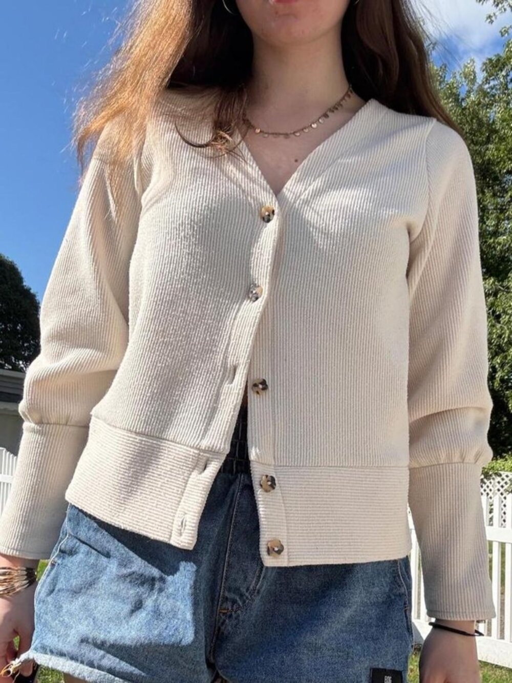 Cream cardigan with flower buttons